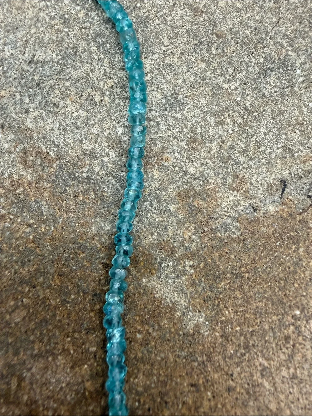 Handcrafted Teal Beaded Necklace with Iridescent Purple Pendant